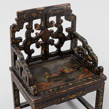 A Chinese lacquered chair, 20th Century.