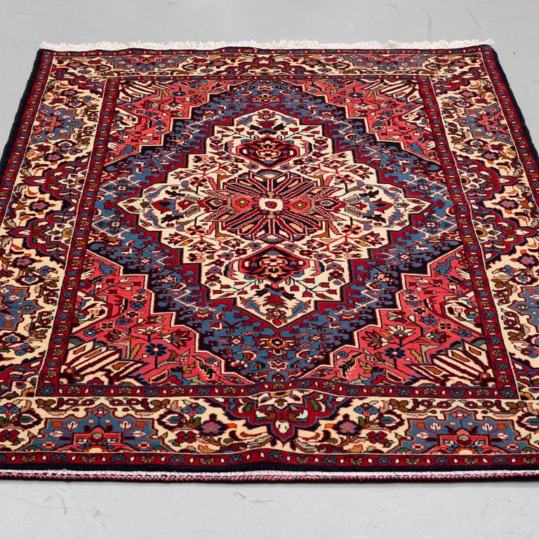A carpet, Hamadan 200 x 134 cm.
