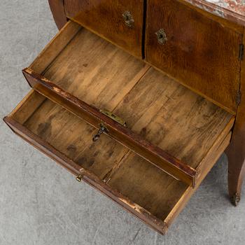 A Rococo cabinet, 18th Century.