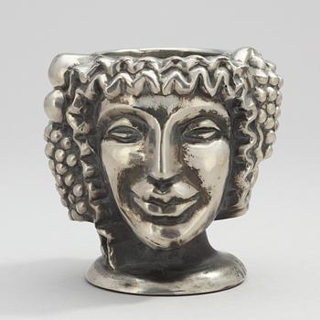 An Anna Petrus "Janus head" pewter vase by Svenskt Tenn 1993.