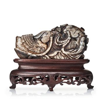 651. A sculptured stone figure of mandarin ducks in a lotus pond, late Qing dynasty, early 20th Century.