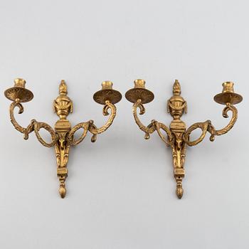 A 20th Century pair of Louis XVI style wall sconces, for two candles.