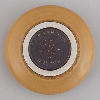 Gunnar Nylund, a set of two stoneware lidded bowls and a bowl, Rörstrand 1940's.