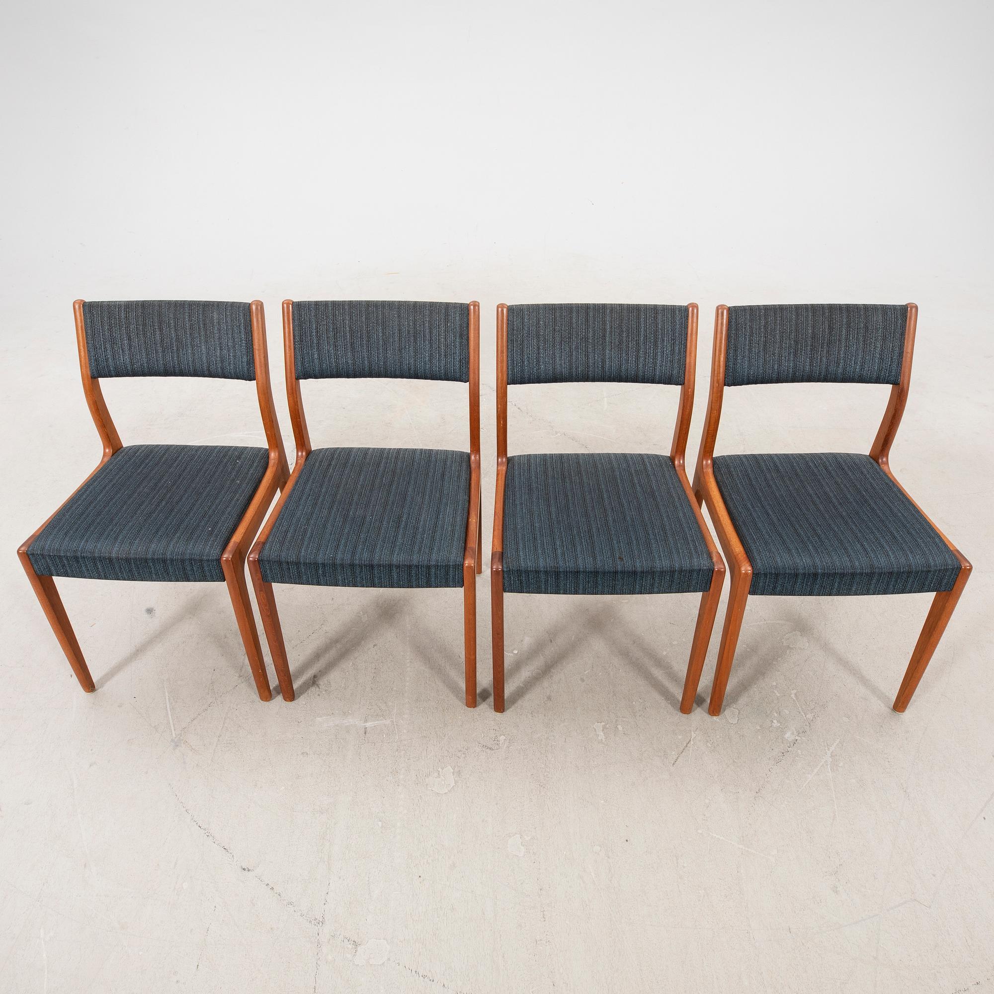 A set of four 1960s teak chairs.