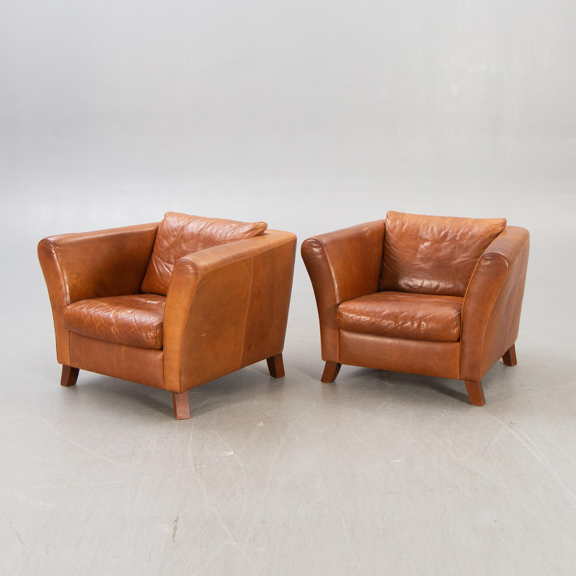 A pair of Lederland leather armchairs Netherlands later part of the 20th century.