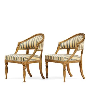 78. A pair of late Gustavian open armchairs attributed to E. Ståhl (master in Stockholm 1794-1820).