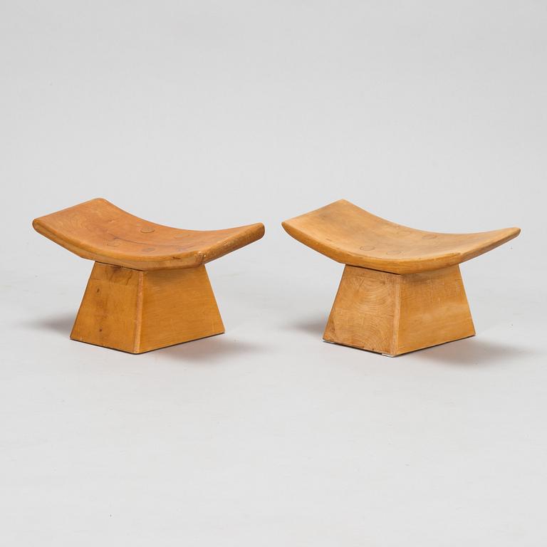 Seven late 20th century stools / meditation benches.