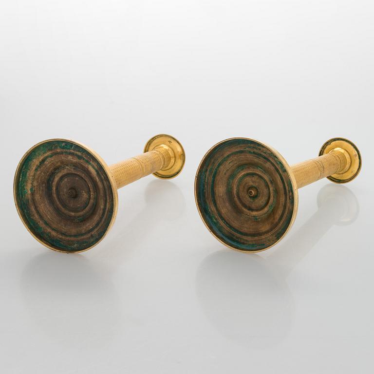 A pair of early 19th century French Empire candlesticks.