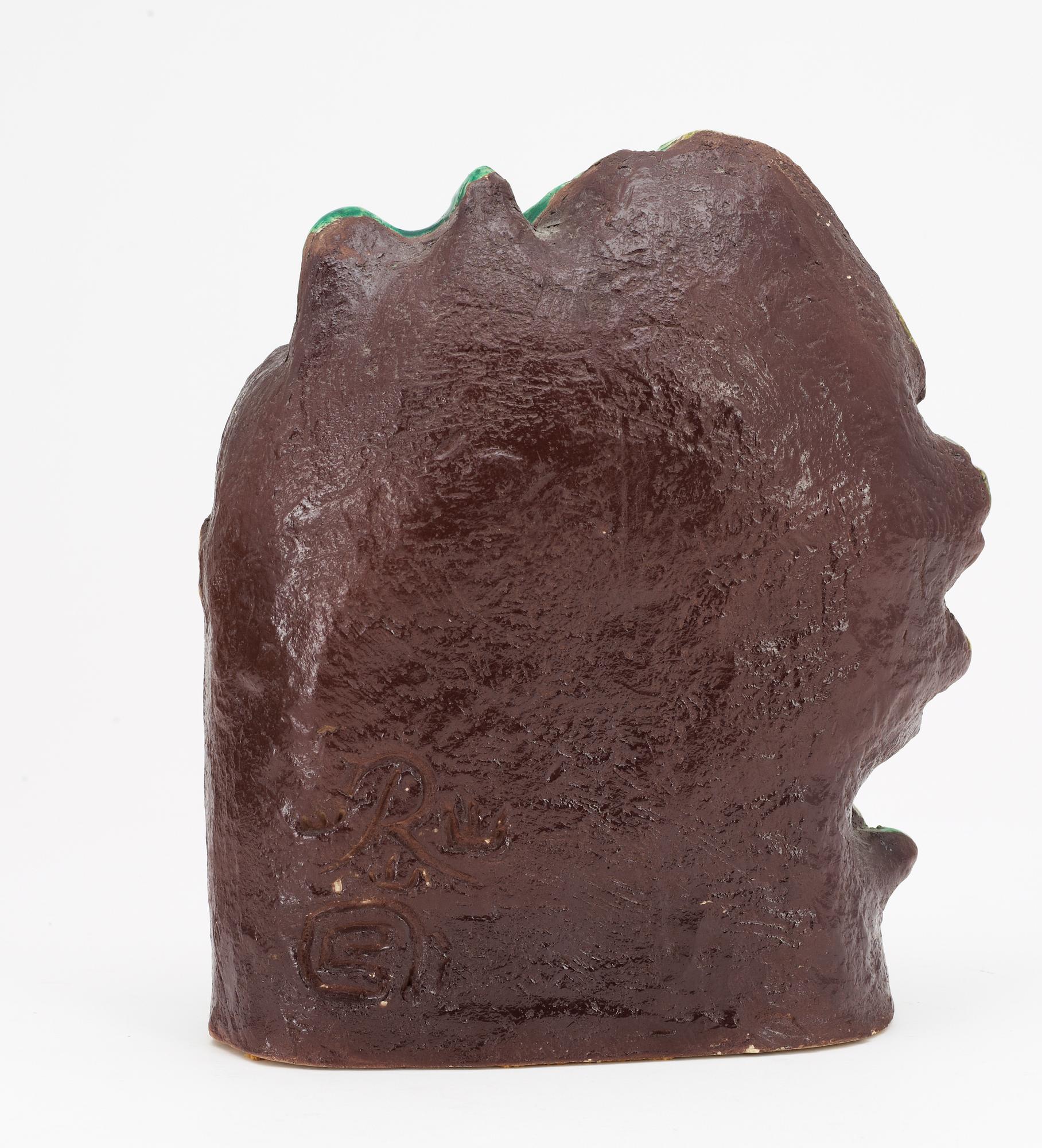 A Gunnar Nylund stoneware sculpture of a water carrier, Rörstrand.