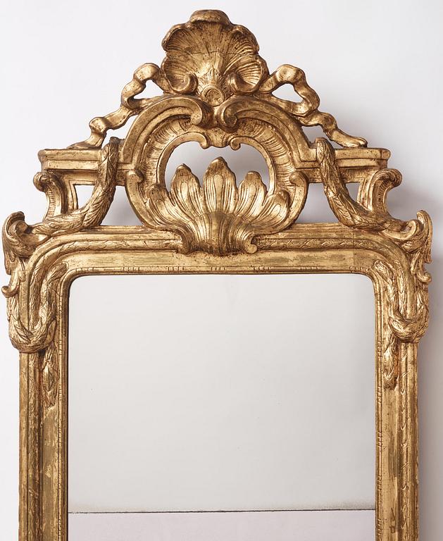 A gitlwood Gustavian mirror by J. Åkerblad (master in Stockholm 1758-99).