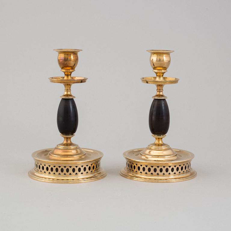 a pair of Skultuna candlesticks from the first half of the 20th century.