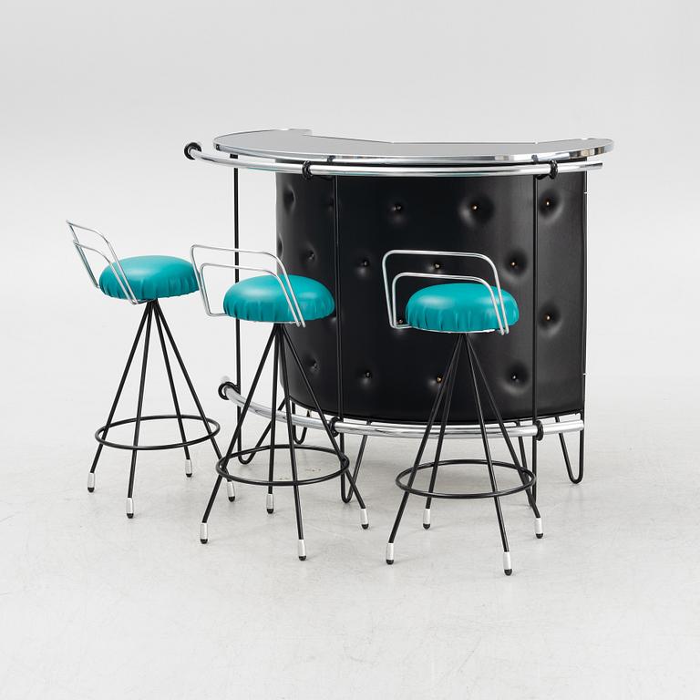 A Bar with three barstools, 1970's.