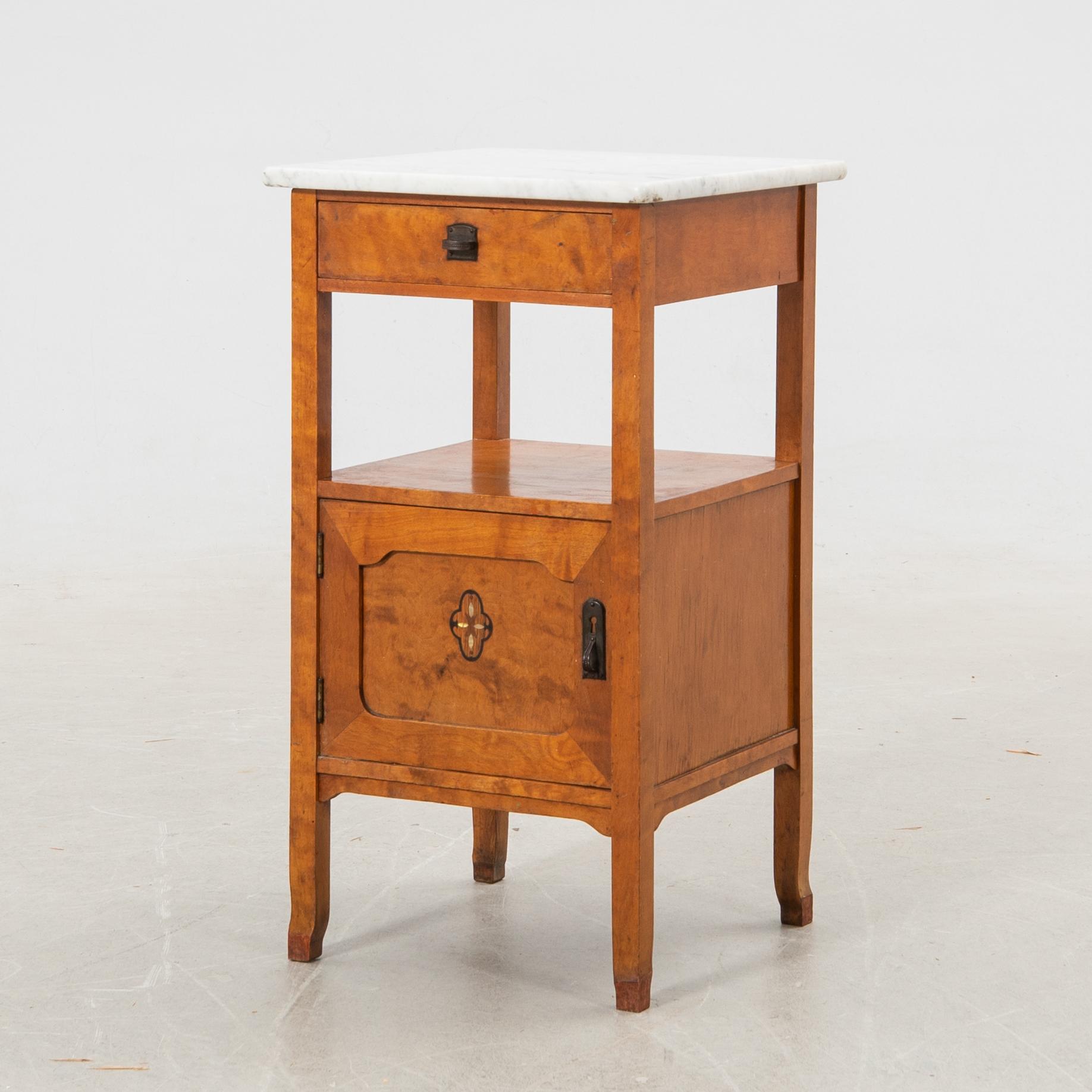 Bedside table with marble top, 20th century.