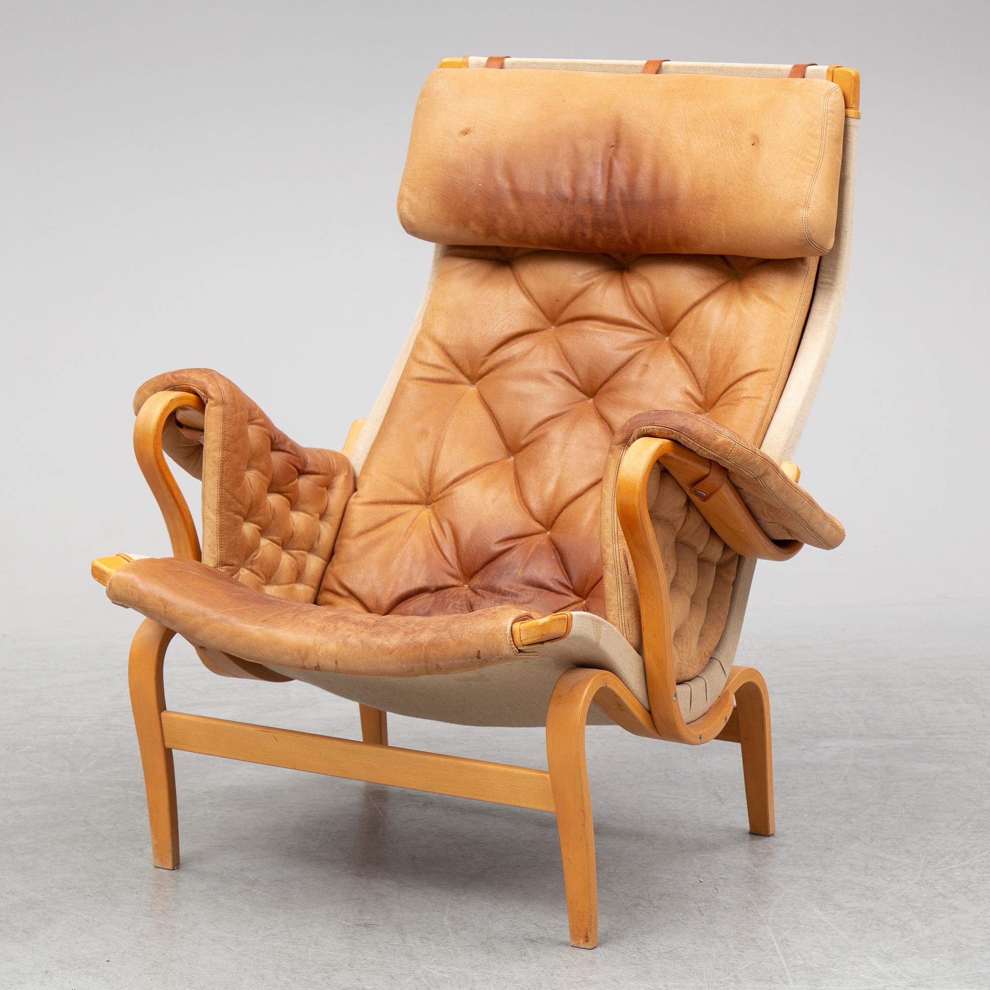 A 'Pernilla' armchair by Bruno Mathsson for dux.