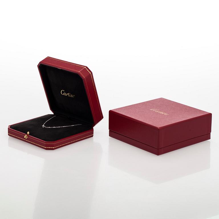 Cartier, an 18K white gold '1895' necklace with a brilliant-cut diamond.