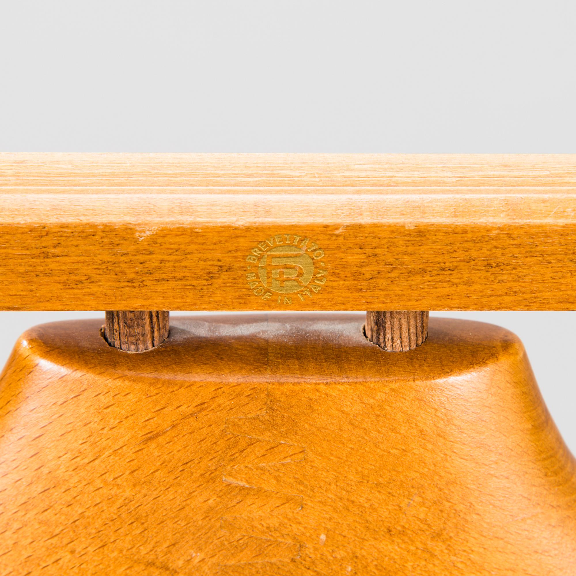 An Italian Fratelli Reguitti valet stand, the latter half of 20th century.