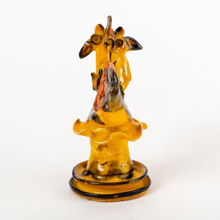 A signed Ulrica Hydman-Vallien stoneware figurine.