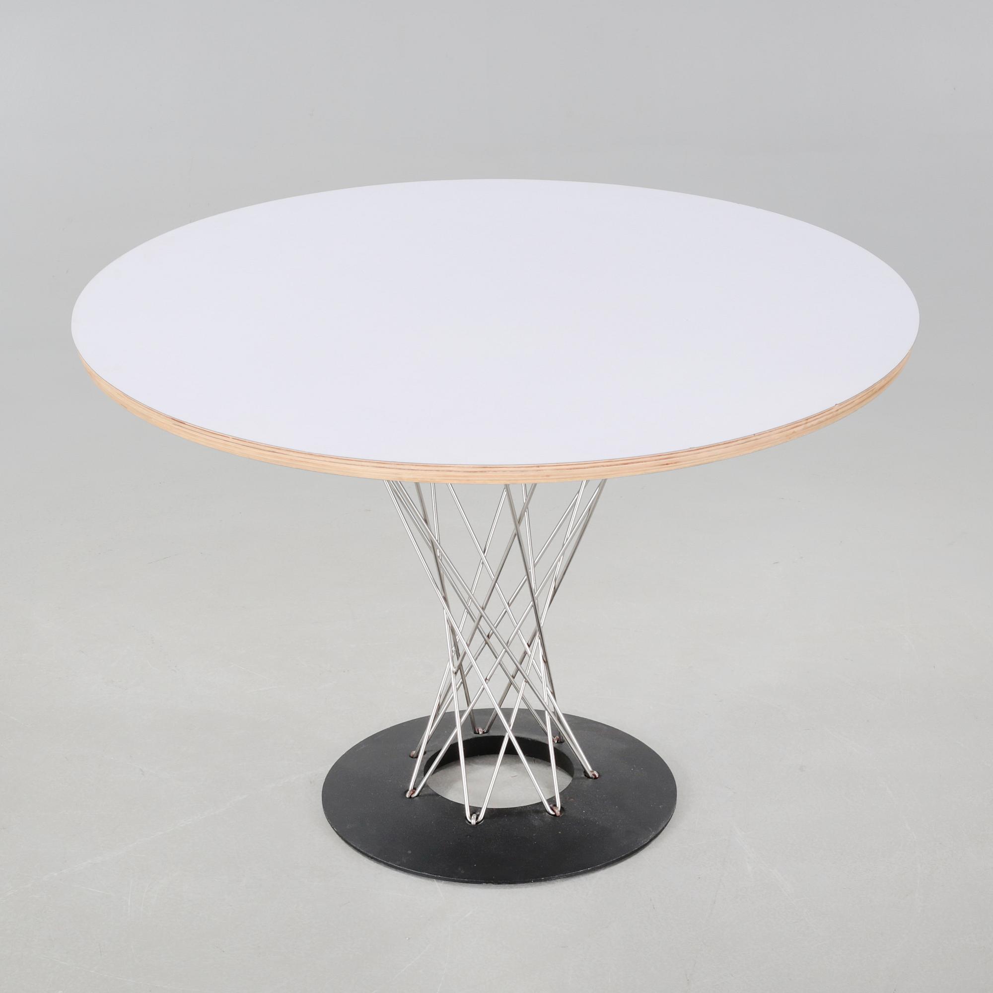 A "Cyclone" dining table, designed by Isamu Noguchi, Knoll.