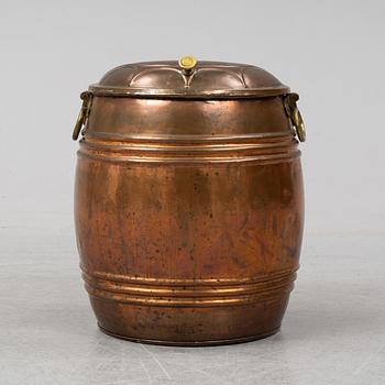 A 19th century copper water barrel.