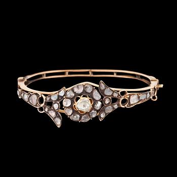 A bangle with rose-cut diamonds.