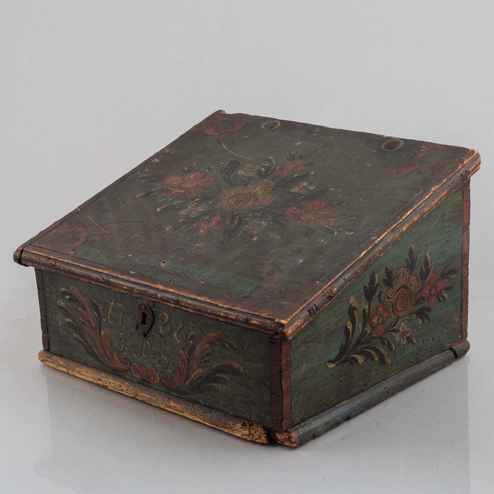 A Swedish polychrome-painted writing box, dated 1788.