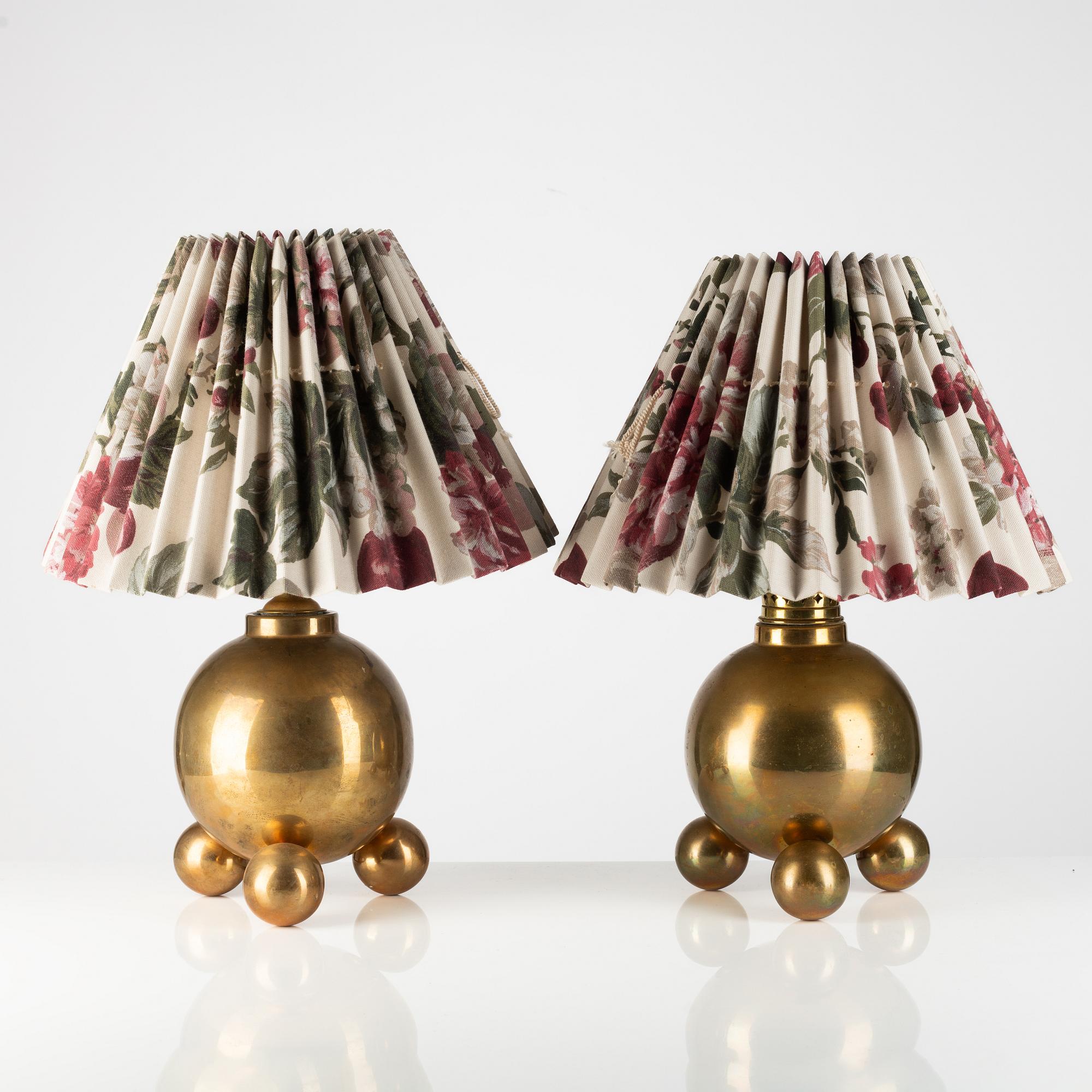 A pair of brass table lamps from Gusums Bruk.