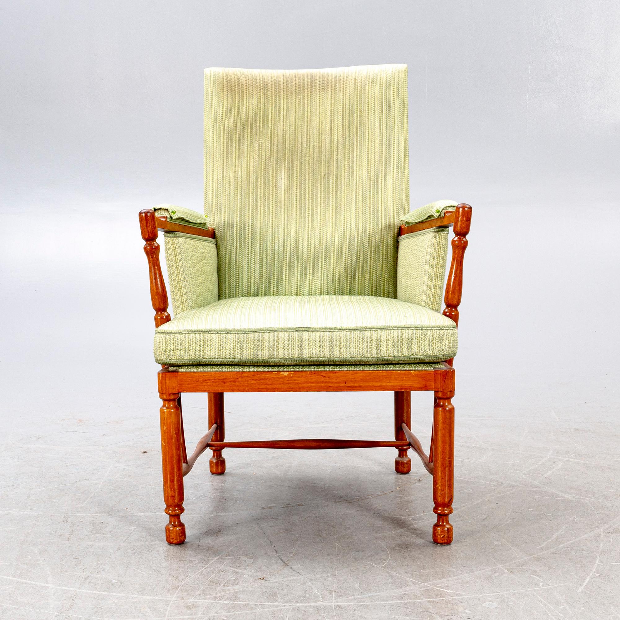 A Josef Frank mahogany armchair model nr 880 Firma Svenskt Tenn.