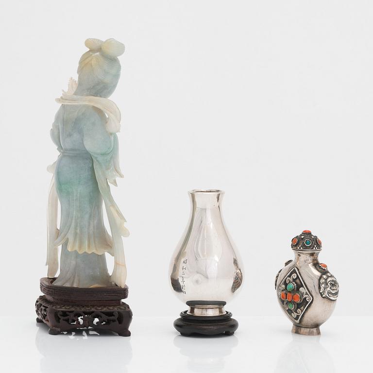 Carved jadeite figurine, and a silver vase and silver snuff bottle, China first half of the 20th Century.