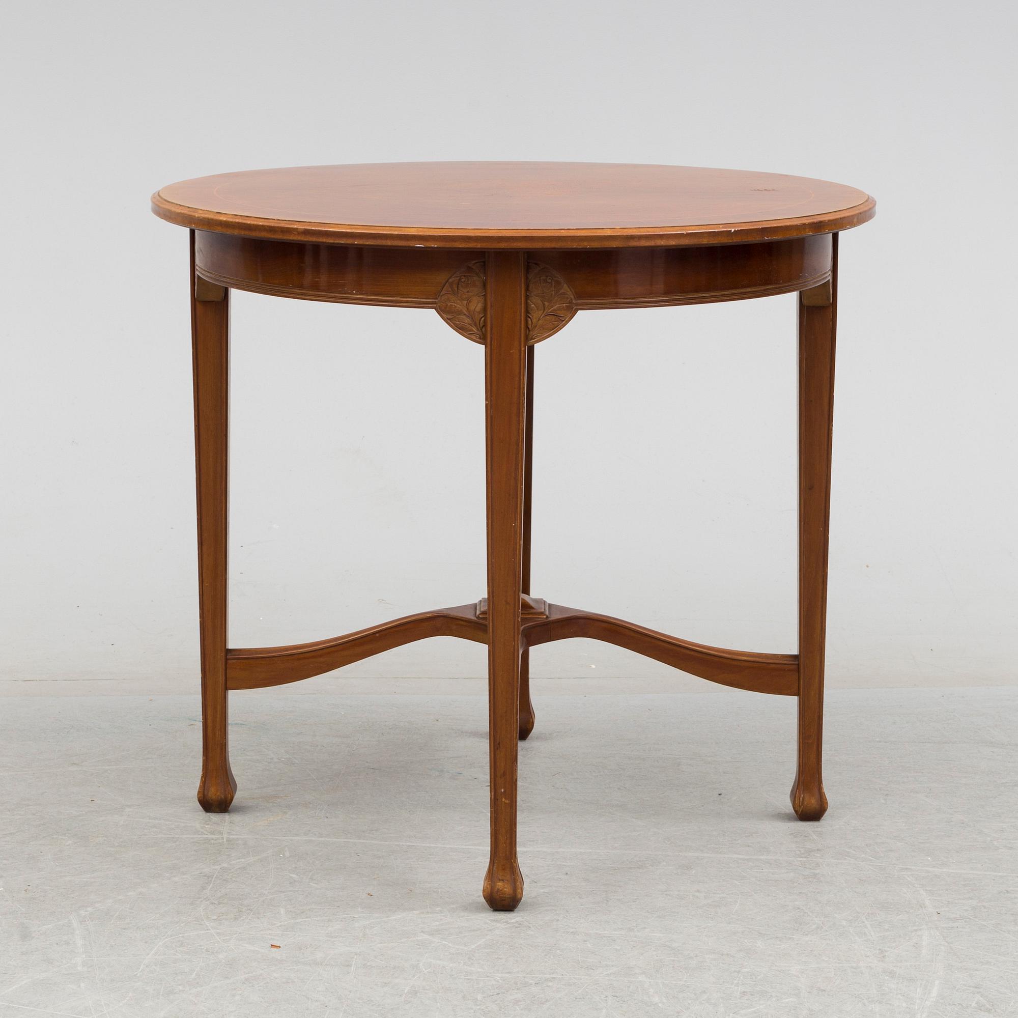 An early 20th century art nouveau table.