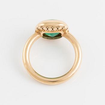 18K gold and cushion shaped emerald ring.