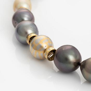 A cultured Tahiti- and South Sea pearl necklace.