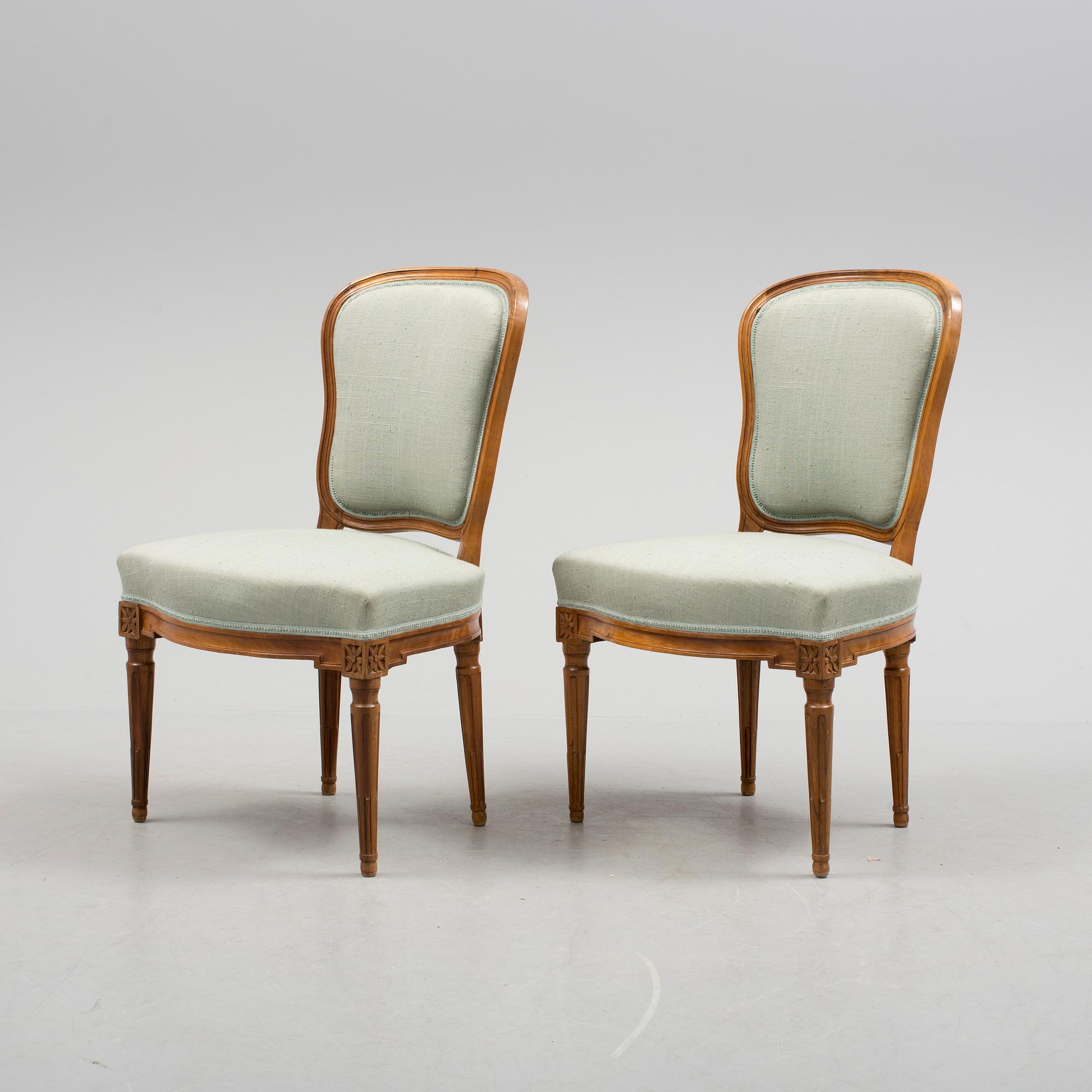 A pair of chairs, circa 1800.