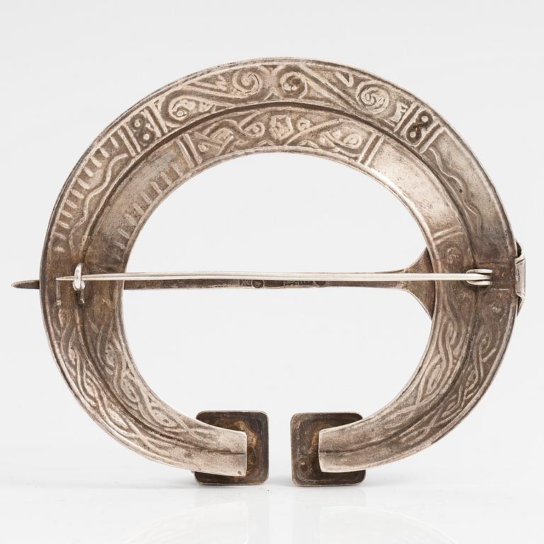 A silver buckle for the ancient Karelian dress. Kalevala koru, Helsinki 1961.