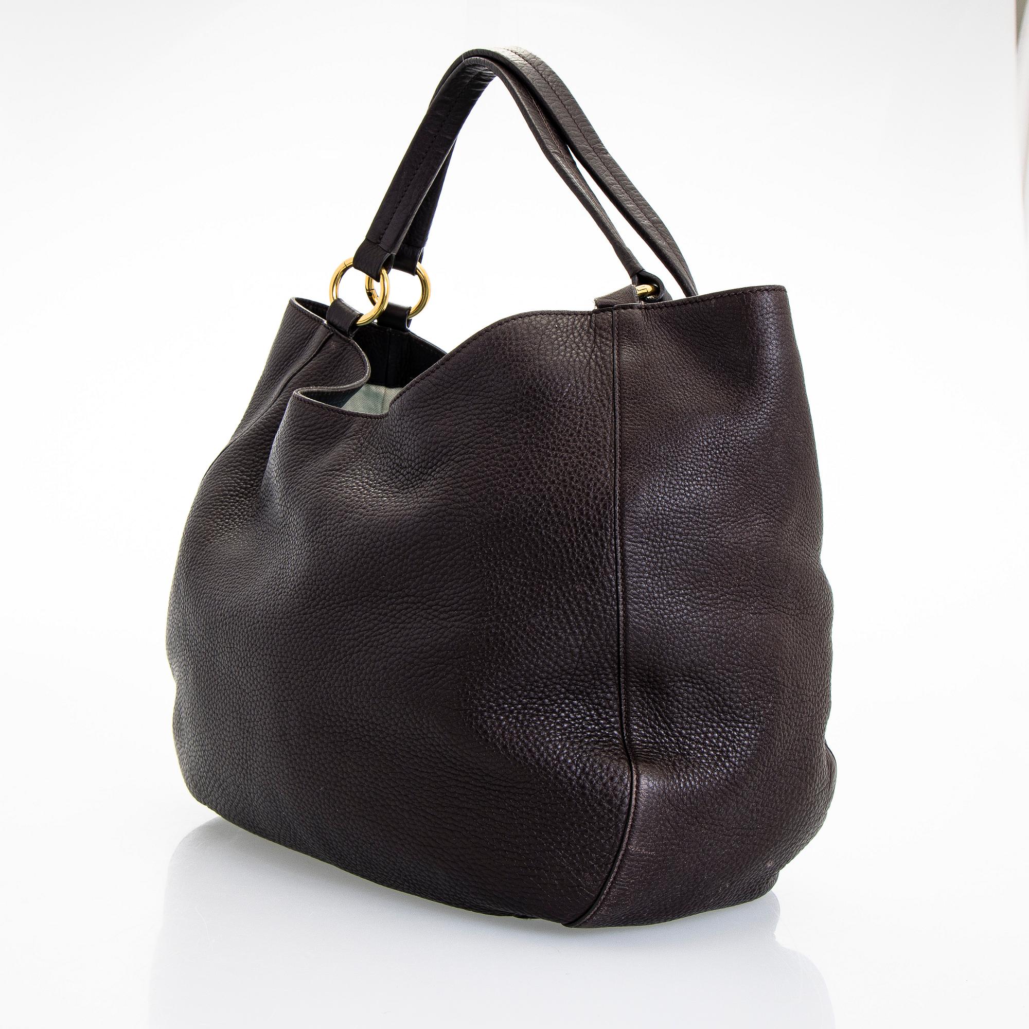 Gucci, an "Interlocking G" bag.