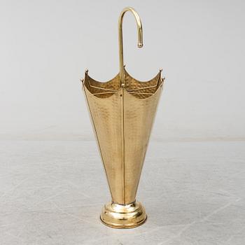 A brass umbrella stand.