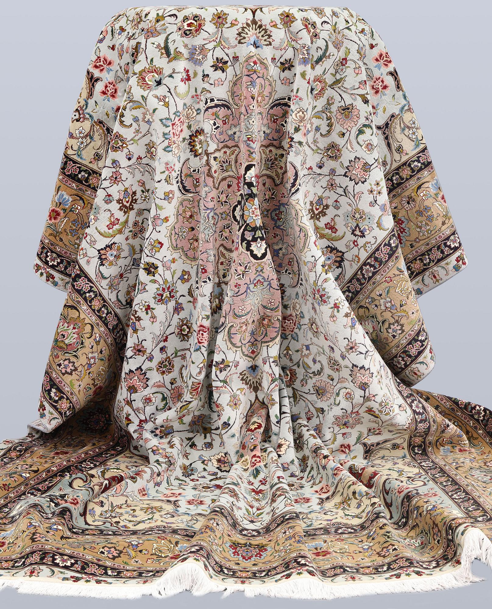 A Tabriz carpet, part silk, so-called 50 Raj, approx. 348 x 252 cm.