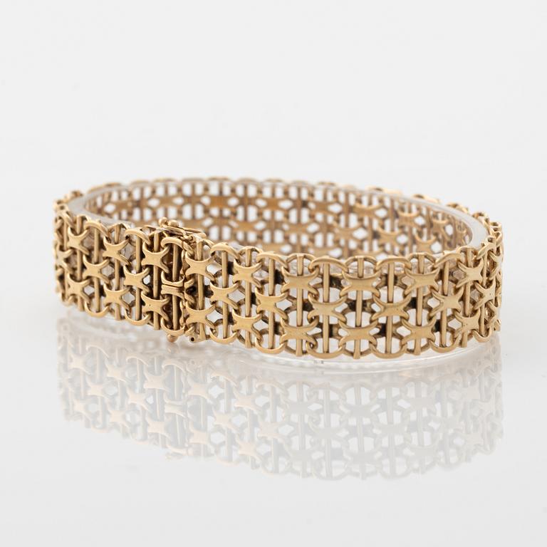 Armband 18K guld, X-länk med stav.