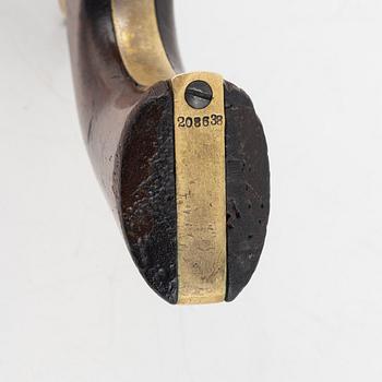 A Colt 1849 Pocket Revolver.