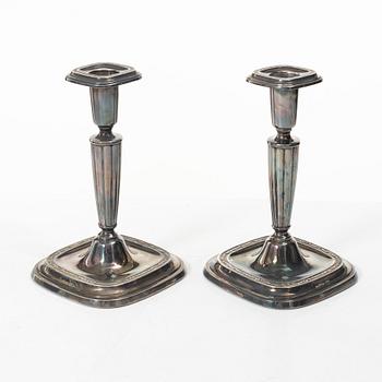A pair of sterling silver candlesticks, C.G.Hallberg, Stockholm, Sweden, 1959.