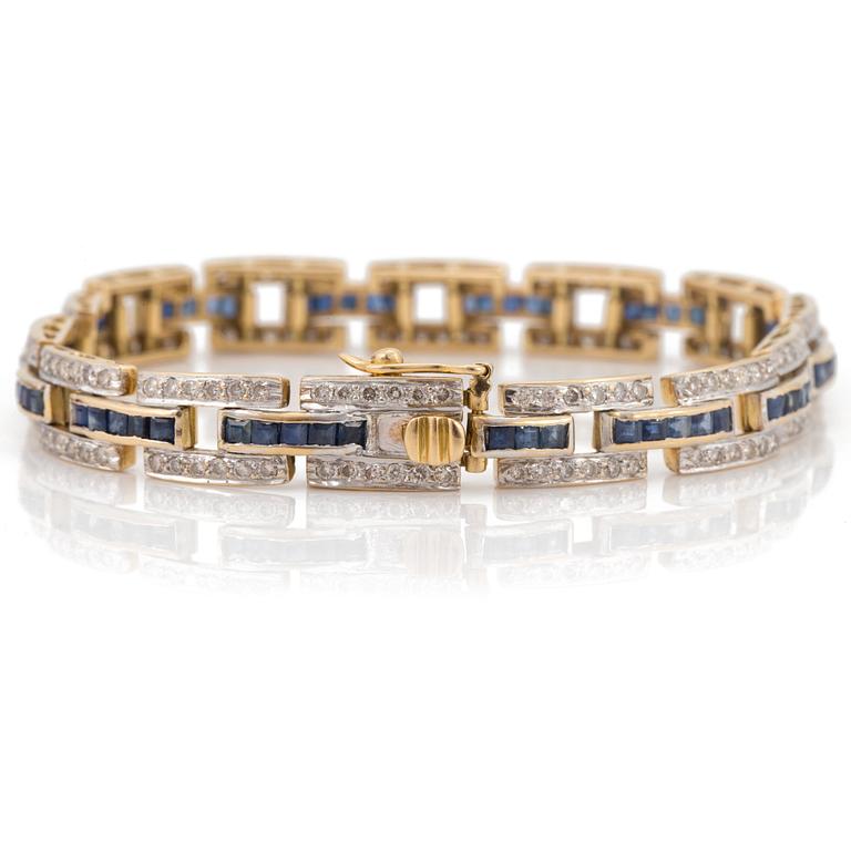 A bracelet set with diamonds and carré-cut sapphires.