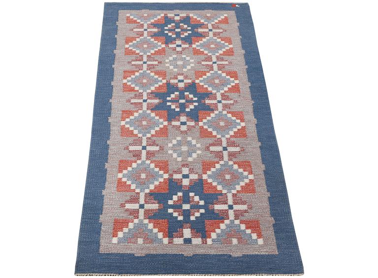 Erik Lundberg, a flat weave carpet, Vätexvaregården, Sweden, c. 227 x 97 cm.