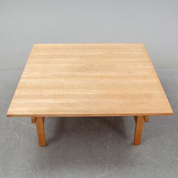 An oak coffee table by Hans J Wegner for Andreas Tuck, Denmark.