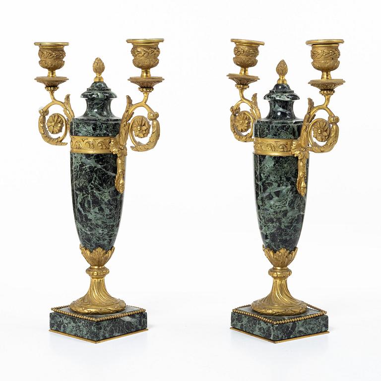 A pair of candelabras, around 1900.