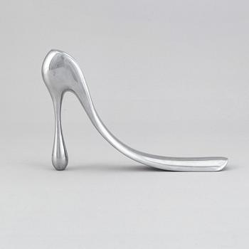A metal shoe horn by Manolo Blahnik, 2000s.