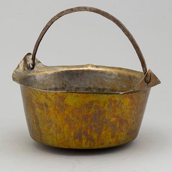 A 18th/19th century brass cauldron.