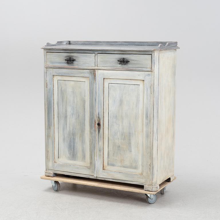 A painted cupboard, late 19th Century.
