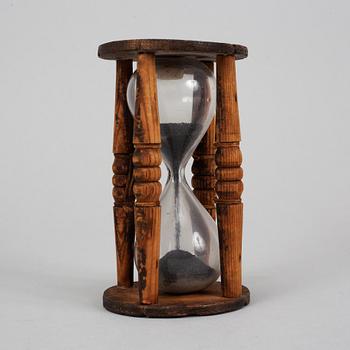 An hourglass, wooden frame, 18th/19th century.