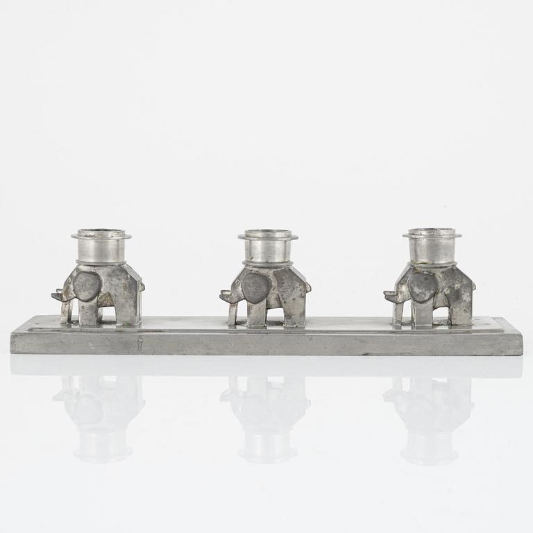 Lidvard Hallset, a pewter candelabrum for three candles, model "1545", Firma Svenskt Tenn, Stockholm 1930.