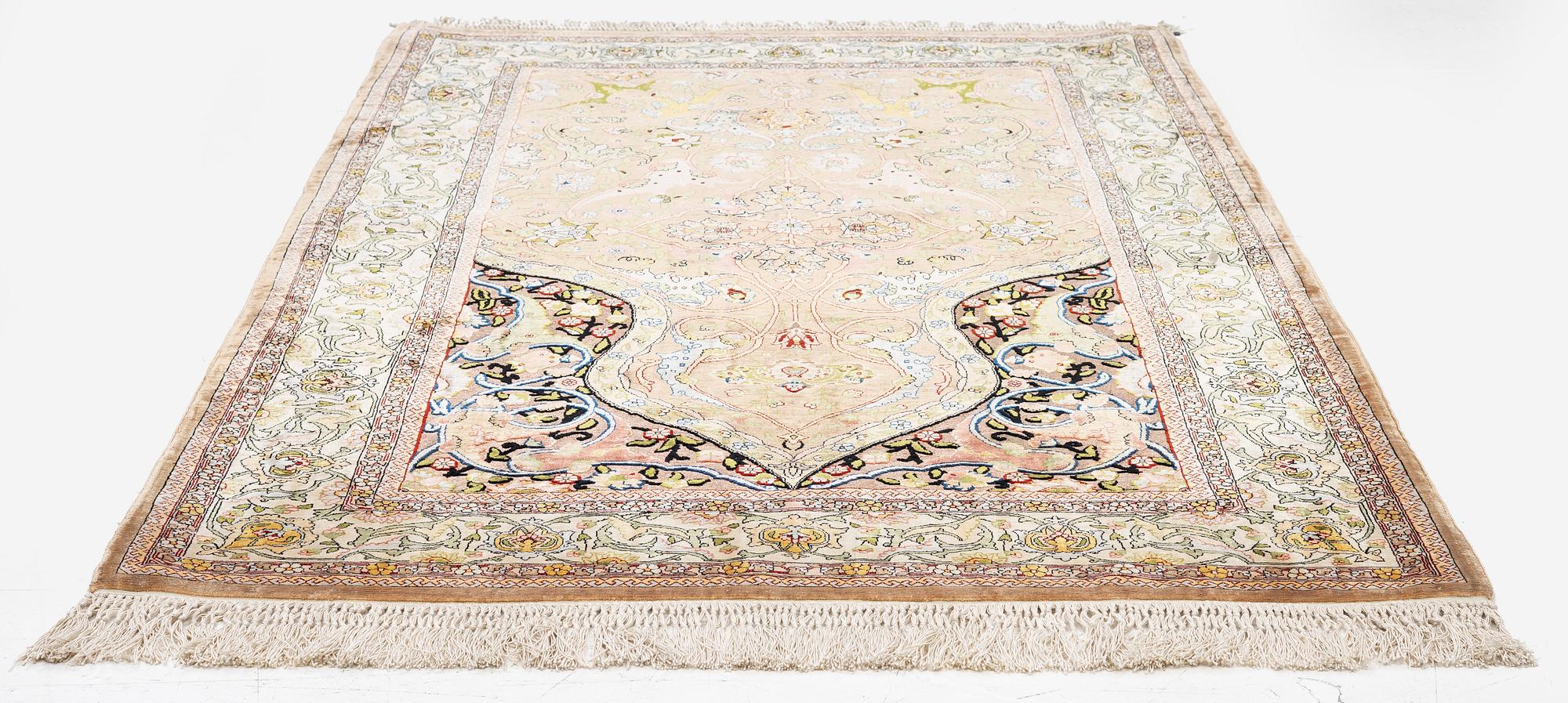 A semi-antique Hereke souf, silk and metal thread rug, West Anatolia, c. 163 x 103 cm.