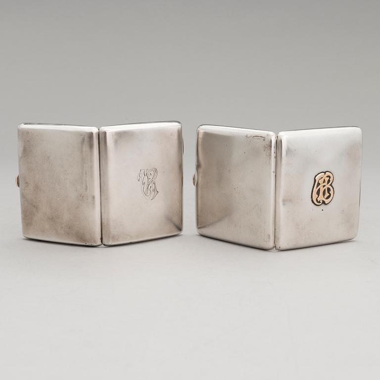 Three silver cigarette cases and a silver pillbox, marked in Finland and Germany, first half of the 20th Century.